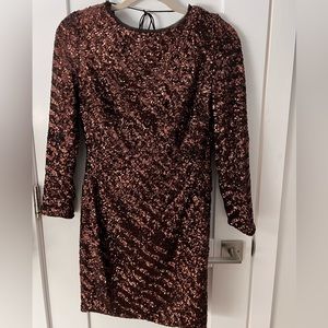 Julian Joyce by Mandalay sequined long sleeve, backless cocktail dress.